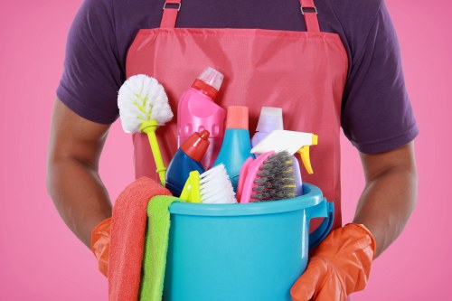 Carpet cleaning team working safely with equipment and protective measures